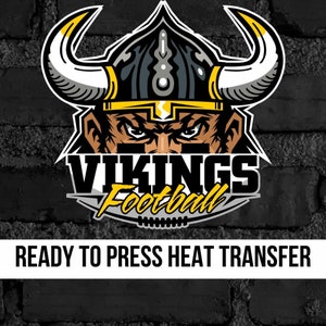 May include: A black and yellow heat transfer design featuring a Viking warrior with horns and a helmet. The text "VIKINGS Football" is below the warrior.