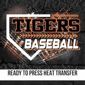 May include: A white baseball home plate graphic with the words "TIGERS BASEBALL" in black text. The graphic is on a black and orange background with a distressed look.