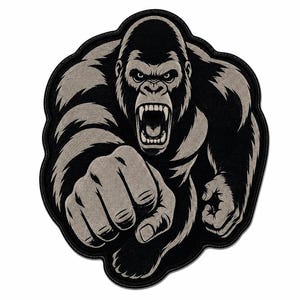 May include: A black and grey embroidered patch featuring a detailed illustration of a gorilla with an open mouth and bared teeth, shown in a forward-facing aggressive pose with one fist extended toward the viewer, finished with a black border.