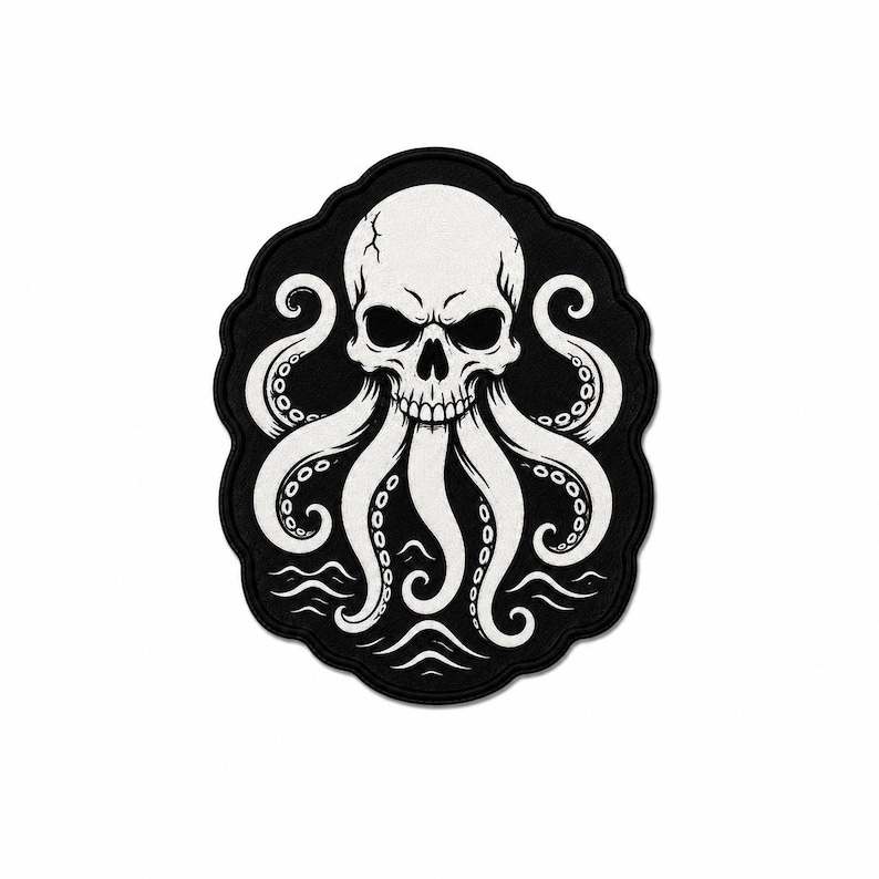 May include: A black and white embroidered patch featuring a central human skull with octopus tentacles extending downwards. The design includes detailed suction cups on the tentacles and stylized wave patterns at the base, all set against a black background.