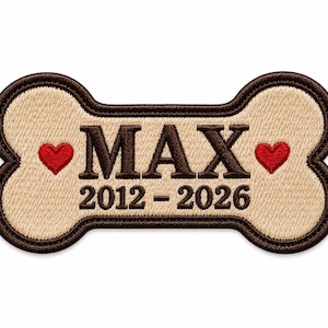 May include: A bone-shaped embroidered patch with a tan centre and a dark brown border. The text MAX is centred in dark brown, with the dates 2012-2026 below it. A small red heart is embroidered on each side of the name MAX on the tan background.