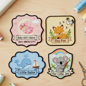 May include: Four embroidered patches with baby-themed designs. One patch features a baby in a pink outfit on a crescent moon. Another shows a sleeping fox with the text "Tiny Fox." A blue whale and sailboat are on a third patch with "Little Sailor." The last patch has a koala and rainbow with "Our Little Joy."