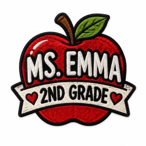 May include: An embroidered patch shaped like a red apple with a green leaf and brown stem. The text MS. EMMA is stitched in white across the apple. A white banner across the centre reads 2ND GRADE in black, flanked by two small red hearts.