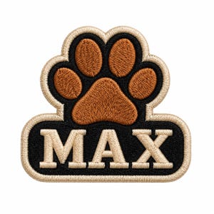 Peut inclure: Un écusson brodé représentant une empreinte de patte marron au-dessus du nom MAX écrit en lettres capitales beiges. Le motif est sur un fond noir avec une bordure beige épaisse, formant une silhouette distincte pour cet accessoire.