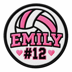 May include: A circular embroidered patch featuring a white volleyball with pink panels. The name EMILY is stitched in pink block letters across the center, with the number #12 in black below, flanked by two small pink embroidered hearts.