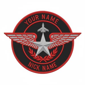 May include: Embroidered patch with a black background and a red border. The design features a silver star, wings, and a small airplane. The text "YOUR NAME" and "NICK NAME" are arched around the top and bottom of the patch in red.