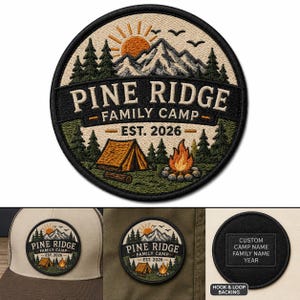 May include: A circular embroidered patch featuring a mountain landscape with a sun, pine trees, a tent, and a campfire. The text reads PINE RIDGE FAMILY CAMP EST. 2026. The patch has a black border and a hook and loop backing for attachment to apparel.