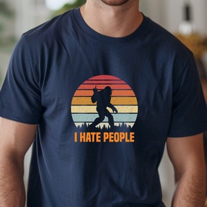 Bigfoot I Hate People T-Shirt, Sasquatch Middle Finger Tee, Novelty Unisex Shirt, Funny Cryptid Gift, Urban Legend Tee, Grumpy Bigfoot