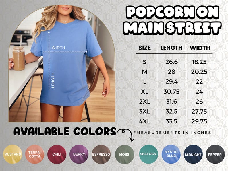 Puede incluir: Una tabla de tallas para una camiseta con el texto "Popcorn on Main Street". La tabla muestra la longitud y el ancho de la camiseta en pulgadas para las tallas S a 4XL. Los colores disponibles son mostaza, terracota, chile, baya, espresso, musgo, espuma de mar, azul m&iacute;stico, azul medianoche y pimienta.