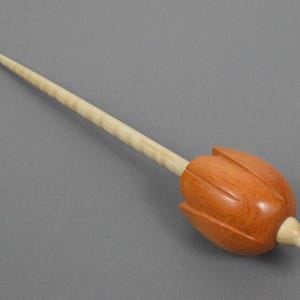 Tulip supported spindle