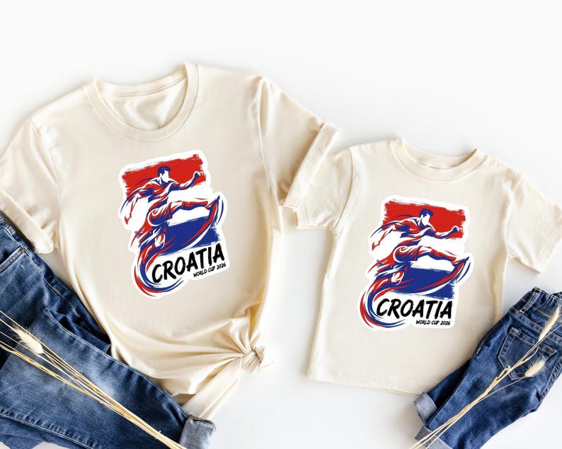 two white t-shirts with the word "Crotia" printed on them, along with a graphic of a person riding a skateboard. The t-shirts are laid out on a white background, with a pair of blue jeans visible in the foreground.