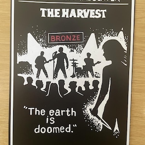 May include: Black and white poster for "Buffy the Vampire Slayer: The Harvest" featuring a band silhouette, crowd, and a woman with a stake. The word "BRONZE" is in a red rectangle. Text: "The earth is doomed."