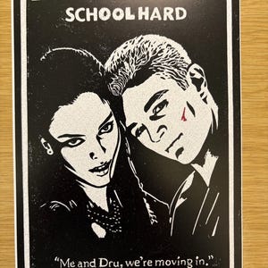 May include: Black and white poster featuring two people from Buffy the Vampire Slayer. The text at the top reads "BUFFY THE VAMPIRE SLAYER SCHOOL HARD." The bottom of the poster has the quote, "Me and Dru, we're moving in."