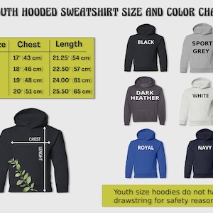 May include: Youth hooded sweatshirt size chart with measurements in inches and centimeters.  The chart shows different colors including black, sport grey, dark heather, white, royal blue, and navy.  The text states that youth size hoodies do not have drawstrings for safety reasons.