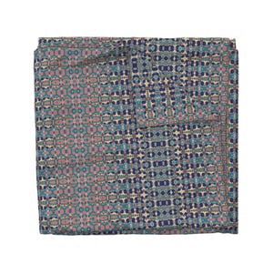 May include: A blue, pink, and green patterned duvet cover with a geometric design.