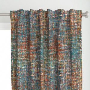 May include: Teal, orange, yellow, and red patterned fabric with a woven texture. The fabric has a subtle shimmer and a slightly distressed look.
