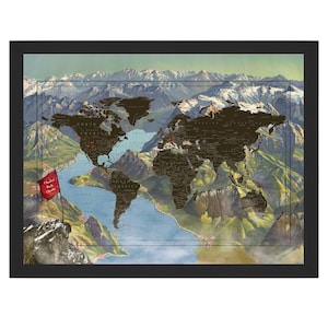 May include: A black and white world map with a red flag that says "Charles Peak Climb" is placed on a mountain peak. The map is surrounded by a black frame and is set against a backdrop of mountains and a blue lake.