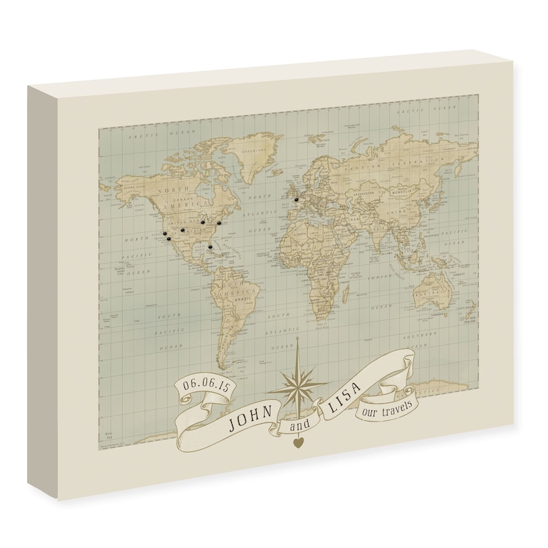 May include: A vintage-style world map with push pins marking locations. The map is on a cream-colored background with a banner at the bottom that reads "06.06.15 JOHN and LISA our travels".