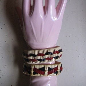 Vintage 1940s 1950s pair of camp plastic wrapped bracelets plus bonus belt