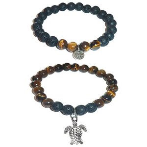 May include: Two beaded bracelets. The top bracelet features black porous lava beads and brown tiger eye beads with a silver-toned lotus flower charm. The bottom bracelet consists of brown tiger eye beads and black lava beads with a silver-toned turtle charm.