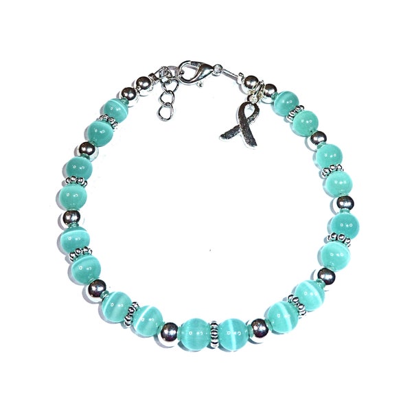 Teal (Ovarian Cancer)) 6mm Beaded Cancer Awareness Packaged Bracelet . Wire and Clasp, 7 3/4 " long with Extension Rings