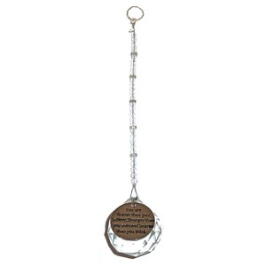 May include: A hanging ornament featuring a clear, multifaceted crystal sphere attached to a vertical strand of small, clear beads. A round, metallic bronze-toned charm is suspended in front of the crystal, inscribed with the text: You are braver than you believe, Stronger than you seem and Smarter than you think.