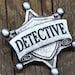 Michael Rossiter reviewed Detective Badge - Cosplay Pin - Handcrafted Pewter Accessories by Doctor Gus - RPG LARP Roleplaying Enamel Pin Badge