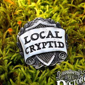 Local Cryptid Badge - RPG Character Class Pin - Handcrafted Pewter Accessories by Doctor Gus - LARP SCA Cosplay Roleplaying Enamel Pin Badge