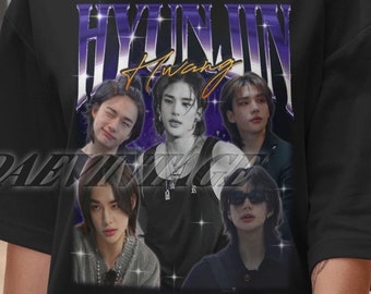 May include: Black t-shirt featuring a graphic print of a group of people with the text "Hyunjin Hwang" in purple lettering.