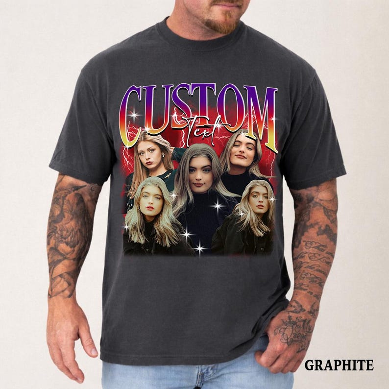 May include: Graphite-colored t-shirt featuring a graphic design with the word "CUSTOM Text" in a retro font. The design includes multiple images of a woman with long blonde hair. The word "GRAPHITE" is printed at the bottom.