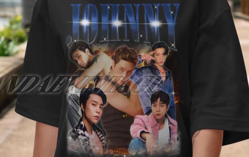 May include: Black t-shirt with a graphic print of five men. The graphic features a vintage style design with the word "JOHNNY" in large, bold letters. The men are wearing various outfits, including a black tank top, a blue and white patterned shirt, a pink shirt, and a black shirt with a white graphic.