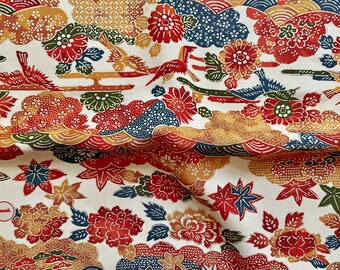 May include: Cream fabric with a Japanese floral design. The pattern includes red, blue, and gold flowers, birds, and cloud motifs. The fabric displays a detailed, repeating pattern, ideal for craft projects and textile applications.