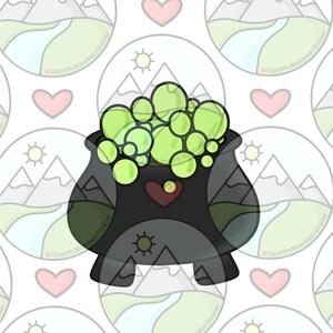 May include: A black cauldron cookie cutter with a green bubbling potion inside. The cauldron has a heart-shaped handle and three legs.