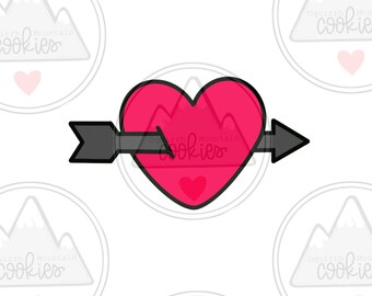 May include: A red heart with an arrow through it. The arrow is gray with a black outline. The heart has a black outline and a small red heart in the center.