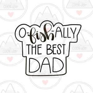 Puede incluir: Un cortador de galletas negro y blanco en forma de burbuja de diálogo con el texto "O-fish-ally the best Dad" en su interior.