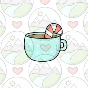 Mug with candy cane cookie cutter