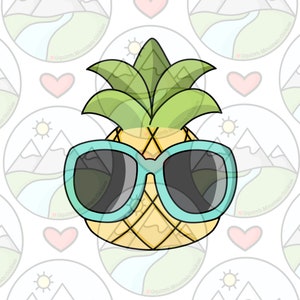 May include: A yellow pineapple cookie with a green top and blue sunglasses. The cookie is decorated with a grid pattern.