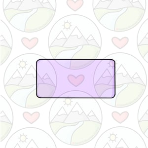 May include: A light purple rectangle with a black outline and a small pink heart in the center. The rectangle is on a white background with a repeating pattern of mountains, suns, and hearts.