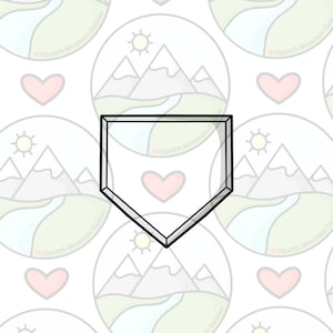 May include: A silver-colored metal cookie cutter shaped like a baseball home plate. The cutter has a heart shape cut out in the center.