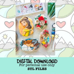 May include: Decorated sugar cookies featuring characters from Beauty and the Beast. The cookies are in various shapes, including Belle's portrait, a floral design, and a scene of Belle and the Beast. The image also includes the text "DIGITAL DOWNLOAD" and "STL FILES".
