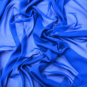 May include: A close-up of a blue sheer fabric with soft, flowing folds. The fabric is translucent and has a delicate texture.