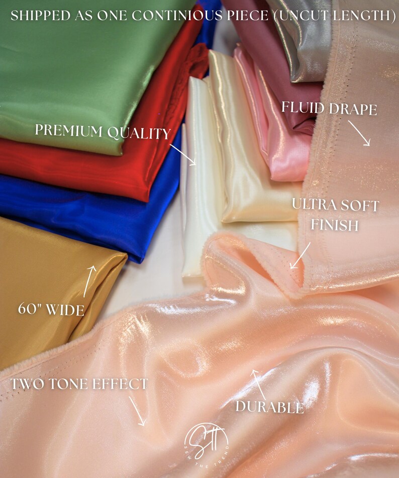 May include: A collection of colorful satin fabric samples in shades of green, red, blue, gold, white, pink, and peach. The fabric is labeled as premium quality, 60" wide, with a fluid drape, ultra-soft finish, two-tone effect, and durable.