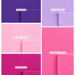 May include: A collection of fleece fabric swatches in six distinct colors, each featuring a textured surface and pinked edges. The colors are labeled as Purple, Lavender, Baby Pink, Candy Pink, and Fuchsia, with one swatch remaining unlabeled.