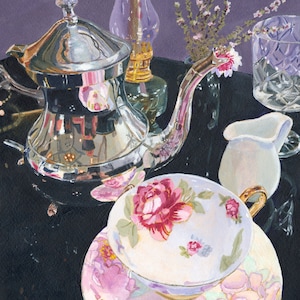 May include: A silver teapot with a floral design on the spout, a white teacup and saucer with pink floral designs, a clear glass oil lamp, and a clear glass vase with pink flowers on a black surface.