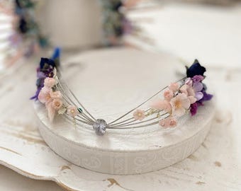 Elven crown richly adorned with rainbow flowers for fairy-tale weddings. Perfect gift for brides and bridesmaids.