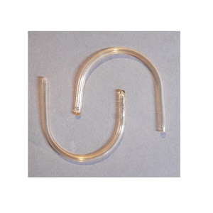 May include: A clear, curved glass handle with a rounded shape. The handle is made of transparent glass and has a slight amber tint. The ends of the handle are open, and the overall design is simple and functional.