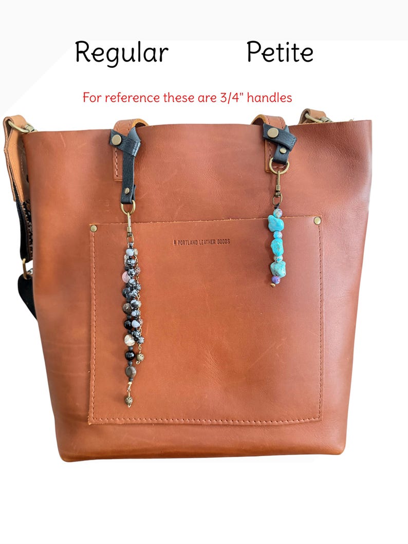May include: A brown leather tote bag with a front pocket and two decorative beaded charms. The text "Regular" and "Petite" are above the bag. The text "For reference these are 3/4" handles" is also visible.