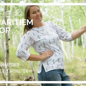 May include: A woman wearing a white shirt with a black lightning bolt pattern, standing in a forest. The shirt has side slits and three-quarter sleeves. The text "THE MARITIEM TOP" and "TEEN-MISSES THE ELI MONSTER" is visible in the image.