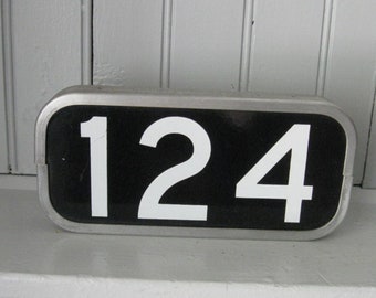 Double Sided Black & White Enamel Number Sign With Aluminum Ribbed Casing