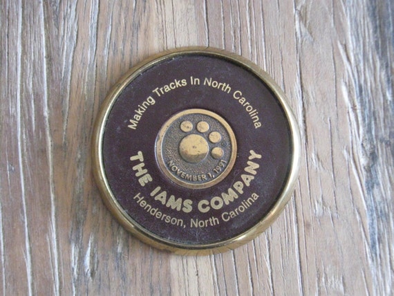 November 1, 1991 the IAMS Co. Brass & Leather Paper Weight Henderson, NC 